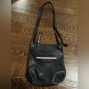 Black faux-leather shoulder bag with long strap